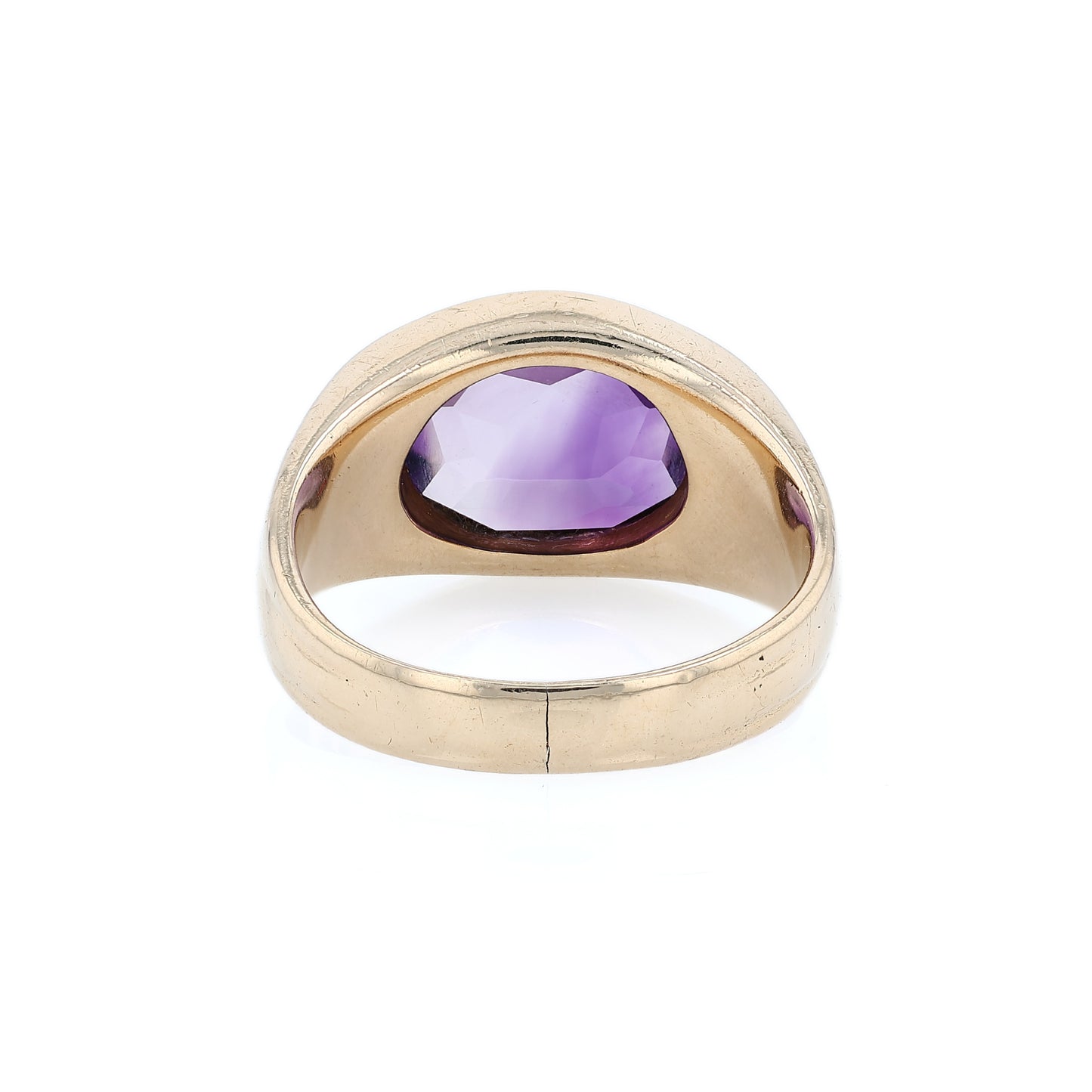 Yellow gold flush bezel set oval amethyst ring on a white background