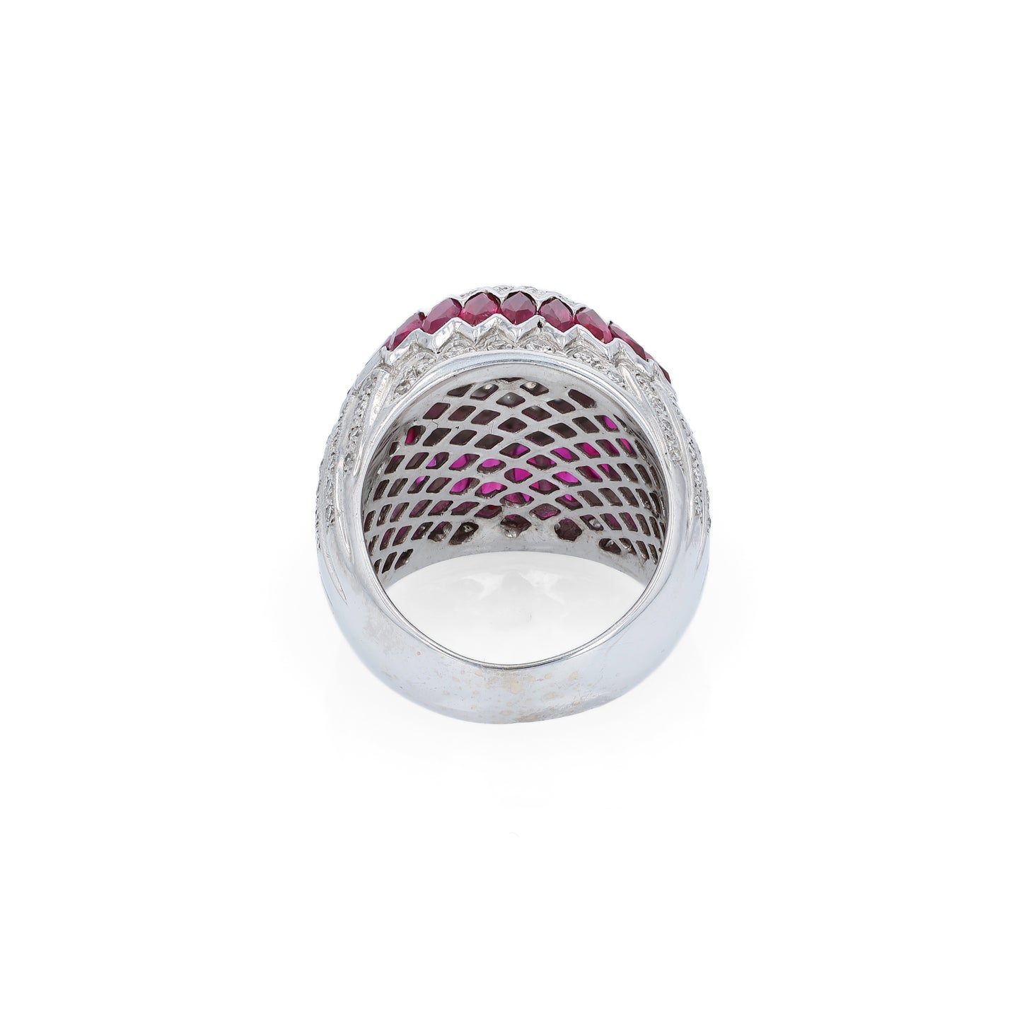 Elegant white gold ring with marquise rubies and diamond accents on a white background