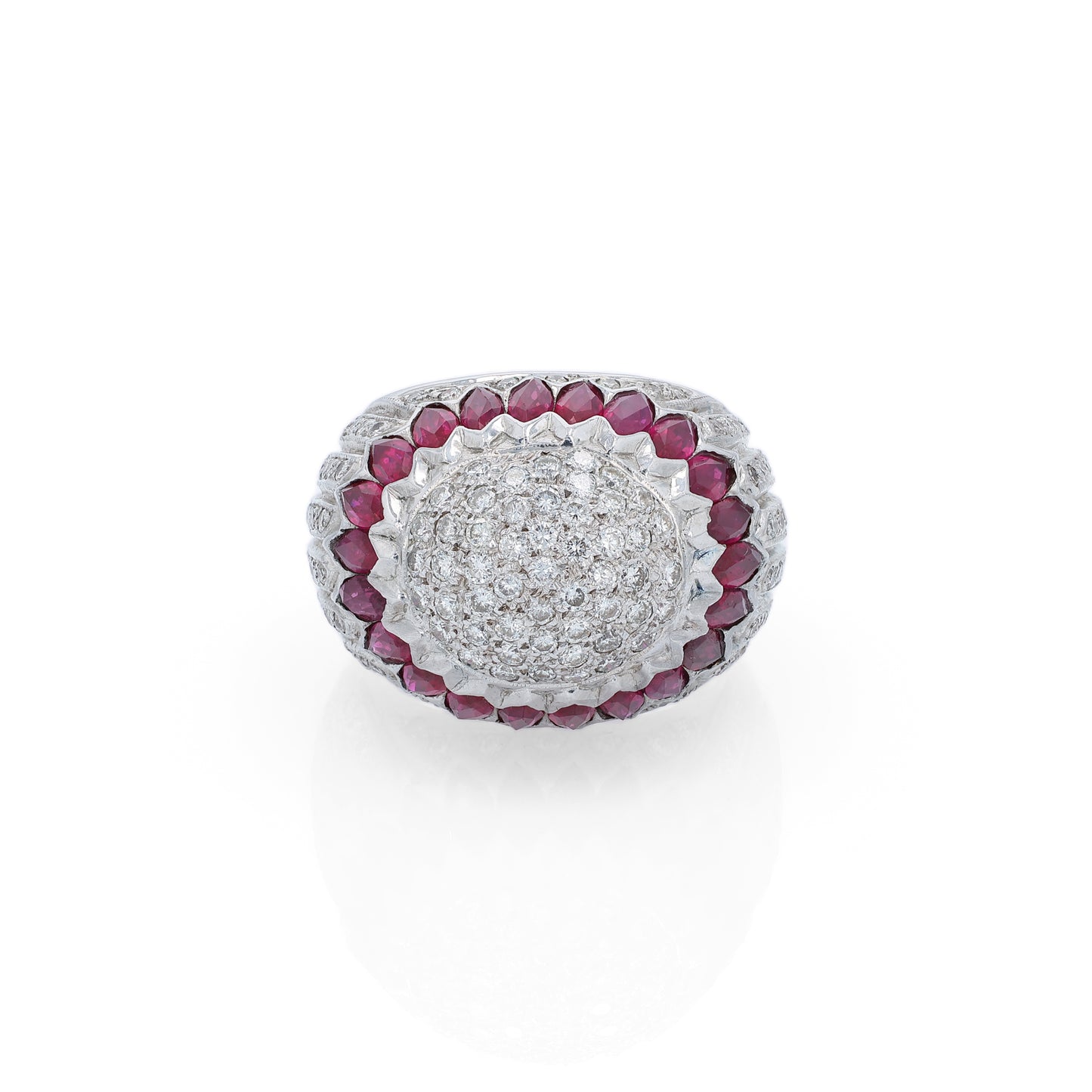 Elegant white gold ring with marquise rubies and diamond accents on a white background