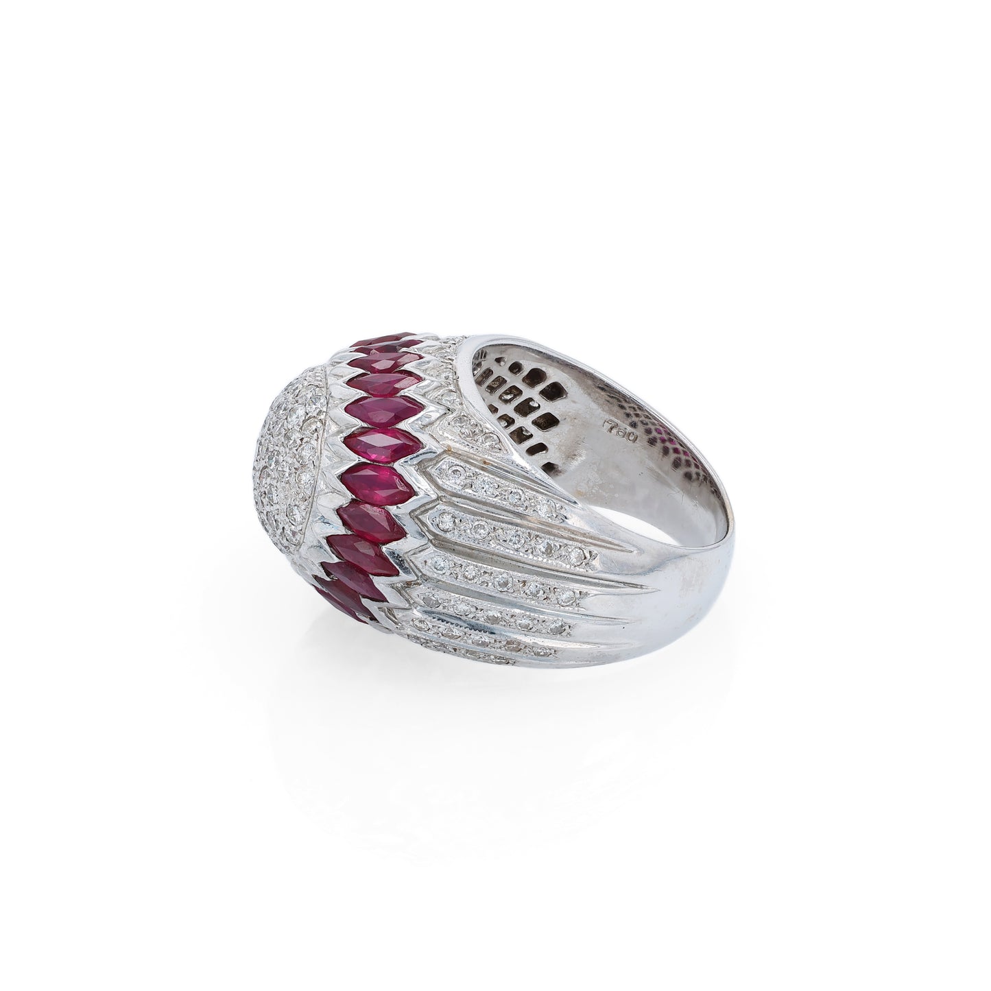 Elegant white gold ring with marquise rubies and diamond accents on a white background