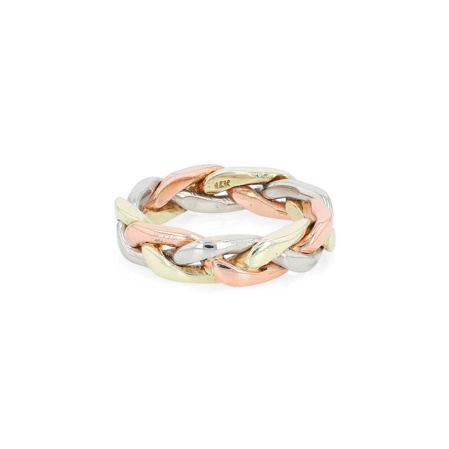 Tri-tone gold braided link design ring on a white background