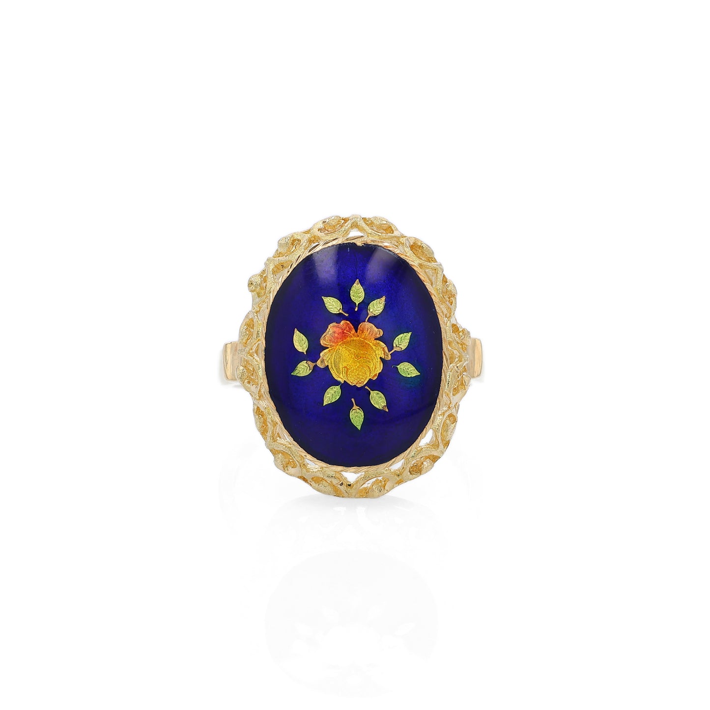 Yellow gold ring with a blue, orange and green flower design enamel center on a white background