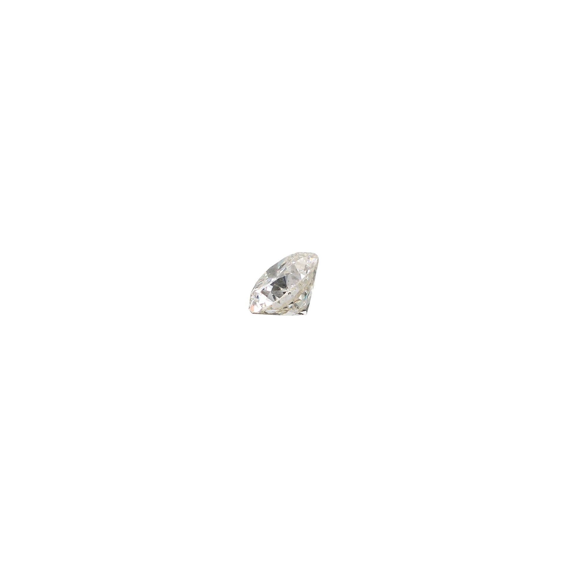 Old european .54 carat diamond graded IVS2 on a white background