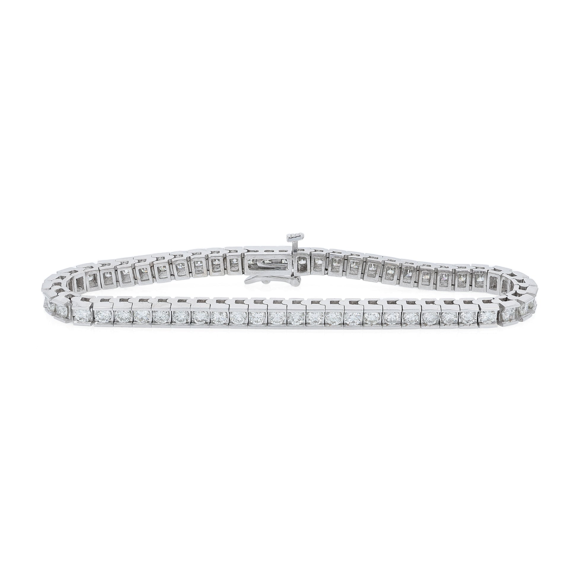 White gold channel set 5 carat diamond tennis bracelet on a white background