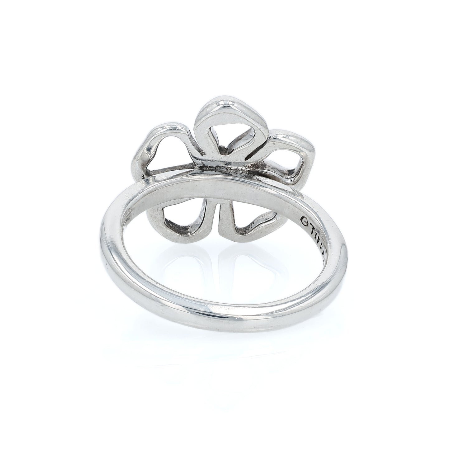 Silver Tiffany & Co open flower design ring on a white background
