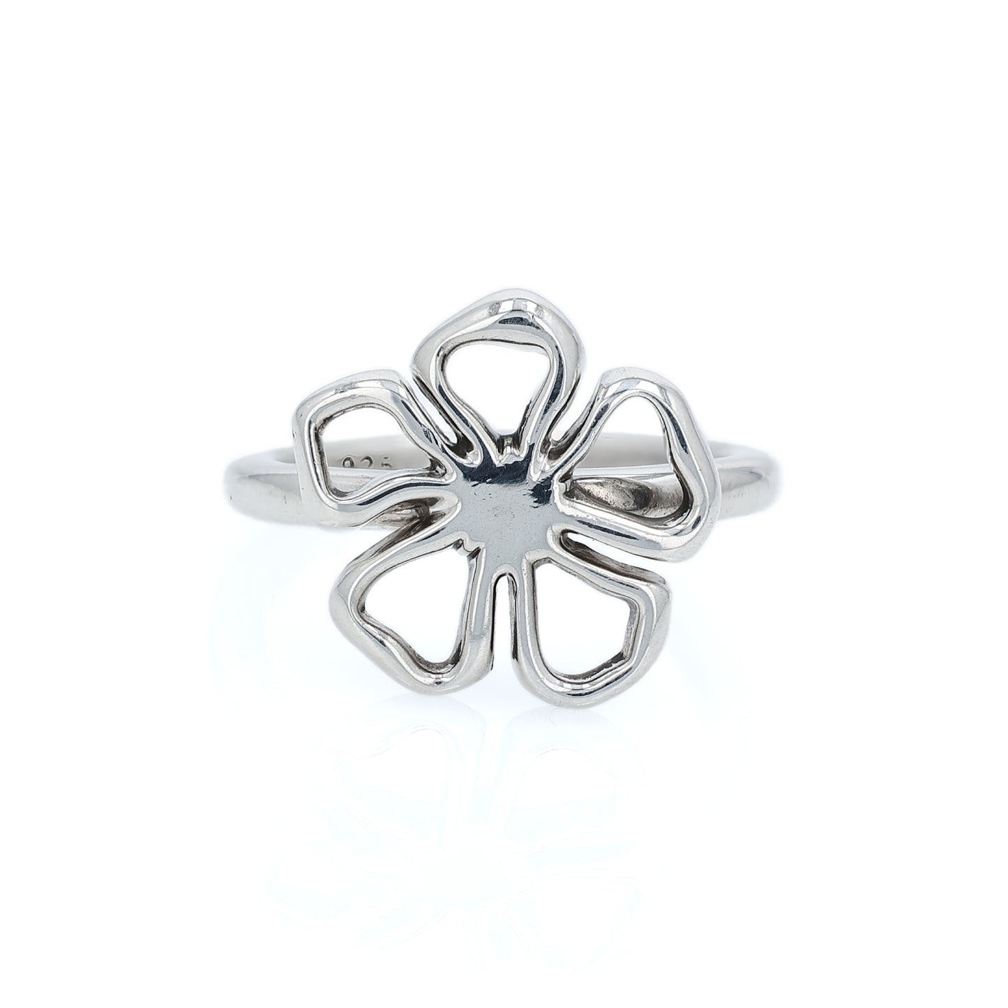 Silver Tiffany & Co open flower design ring on a white background
