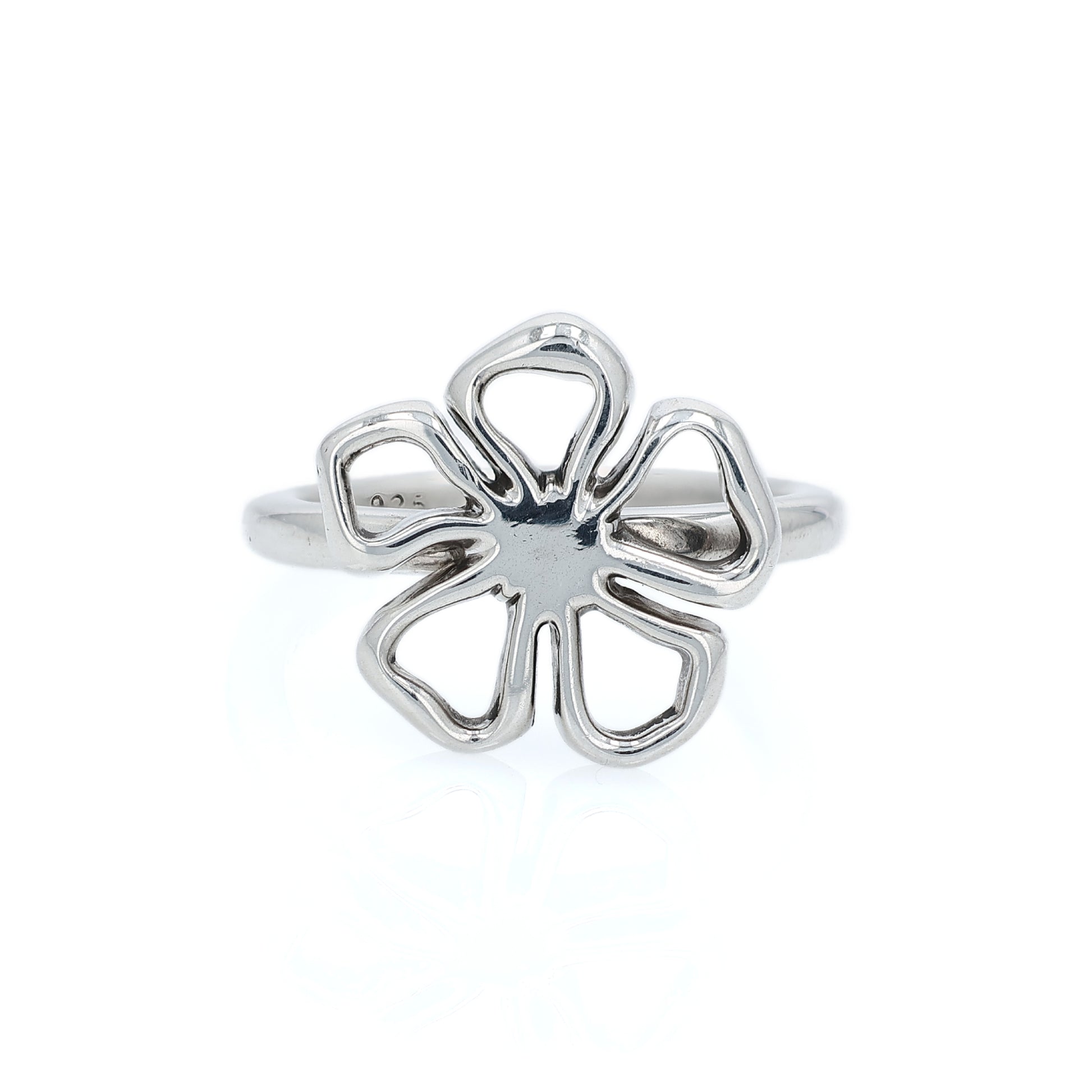 Silver Tiffany & Co open flower design ring on a white background