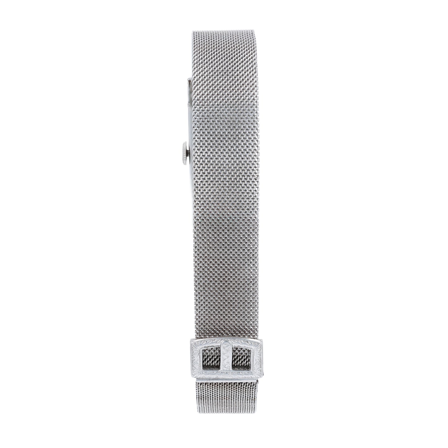 Estate platinum and white gold watch with diamond and emerald accents on case front with an off white dial on a white background