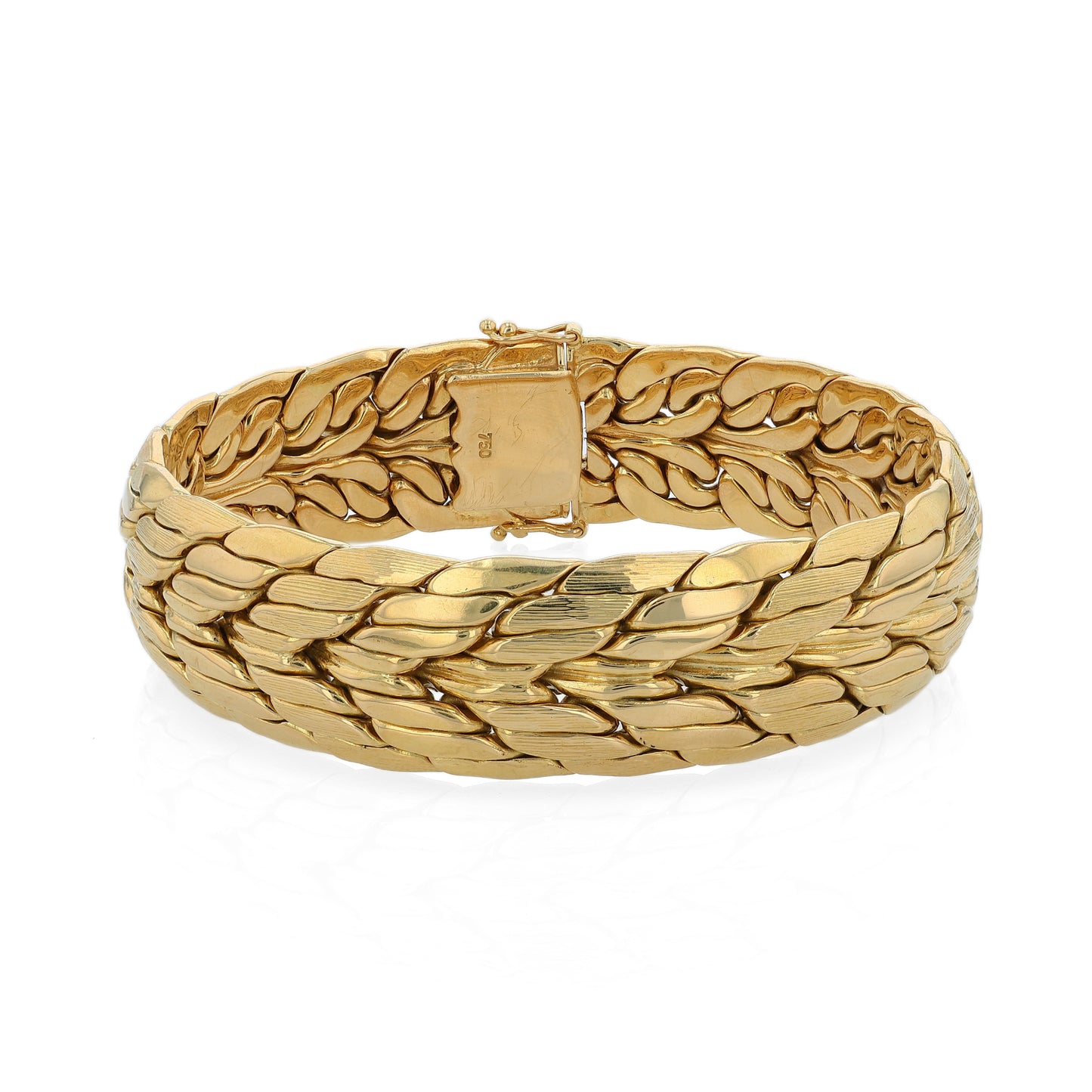 Brushed and polished yellow gold bracelet on a white background