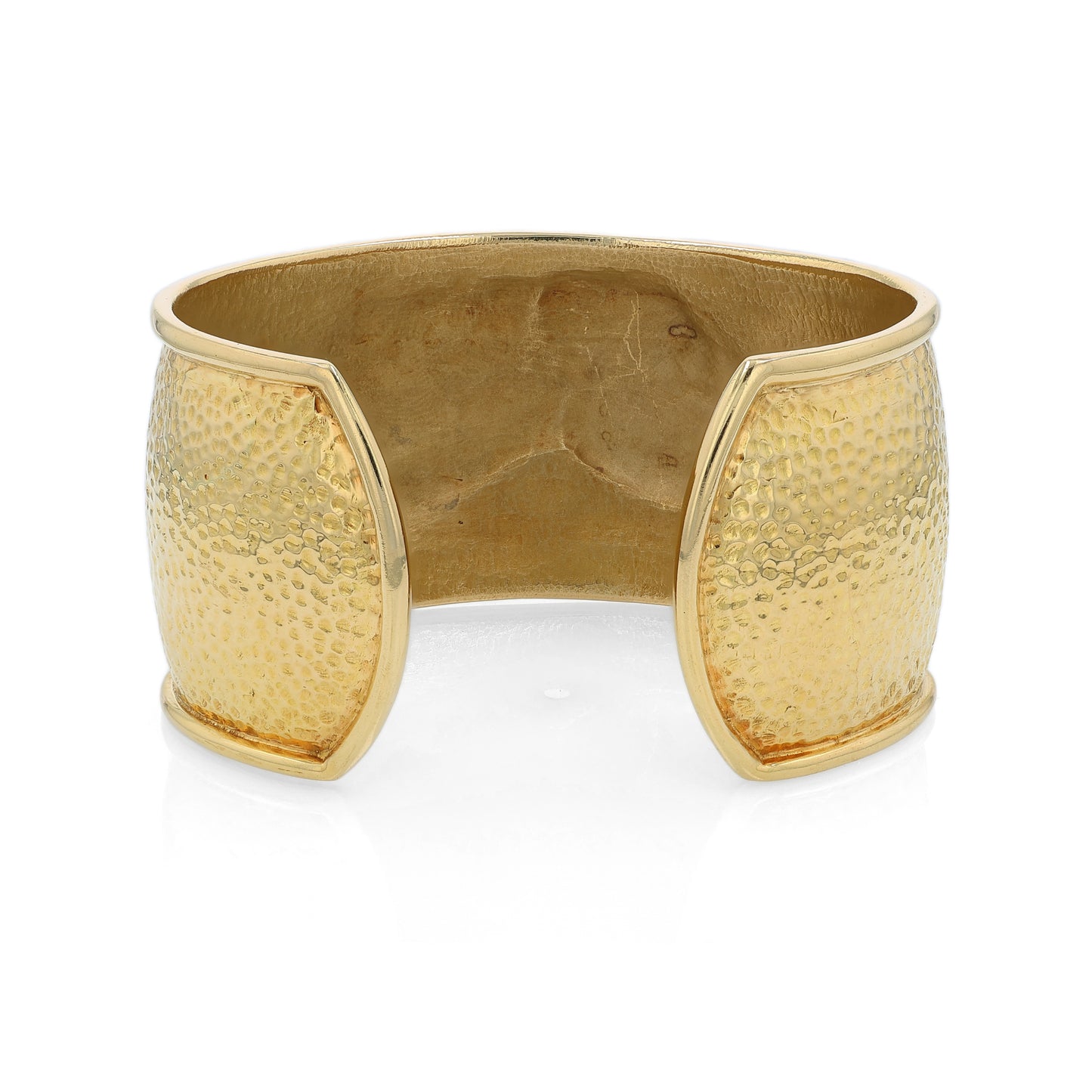 Back angle of a gold cuff bracelet with horse head design on a white background