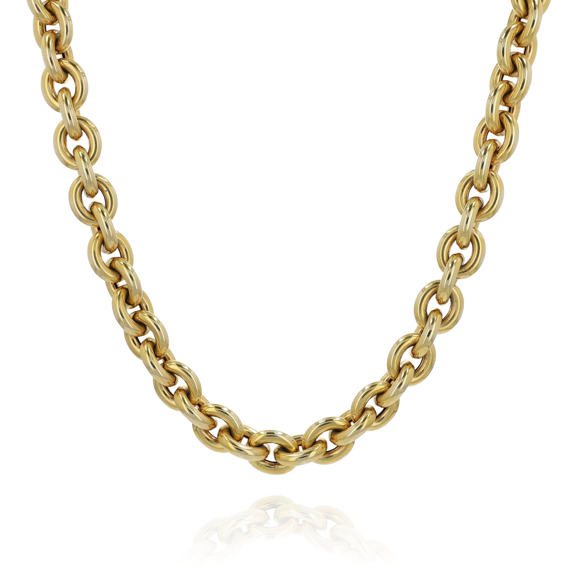 Yellow gold oval link chain necklace on a white background