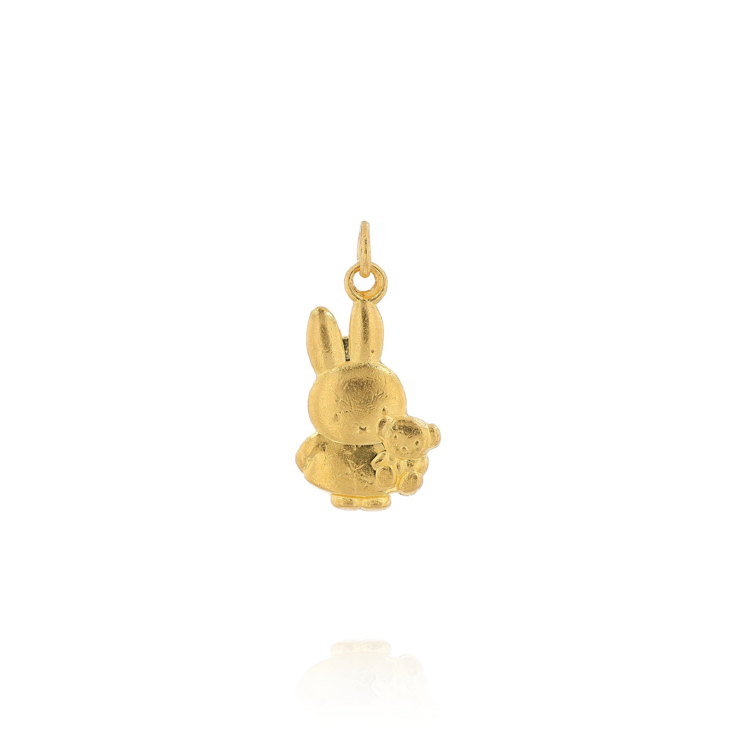 Yellow gold pendant depicting Miffy the Rabbit holding a stuffed animal bear on a white background