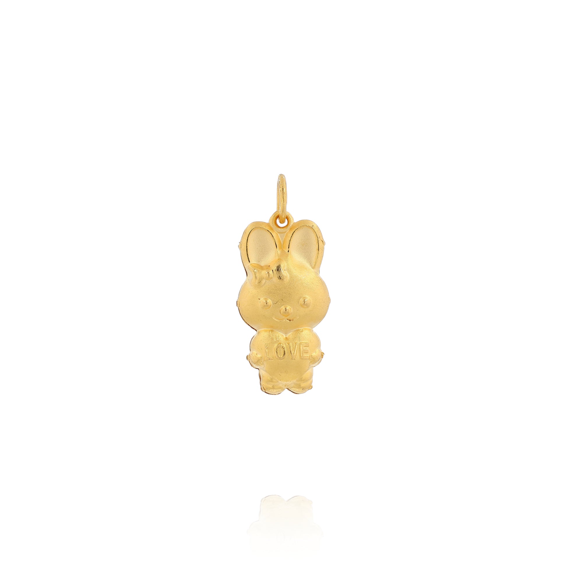 Yellow gold brushed bunny pendant holding a heart reading "LOVE" on a white background