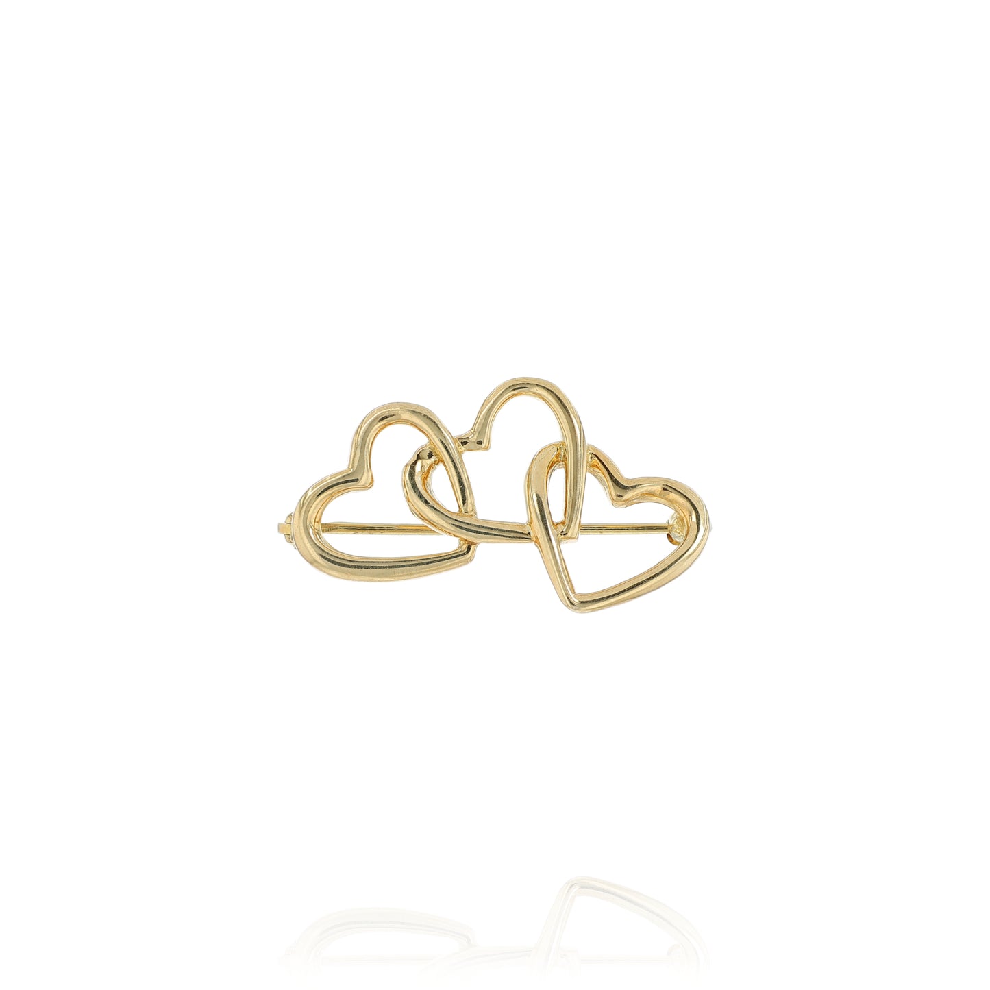 Yellow gold Tiffany & Co polished triple heart pin on a white background