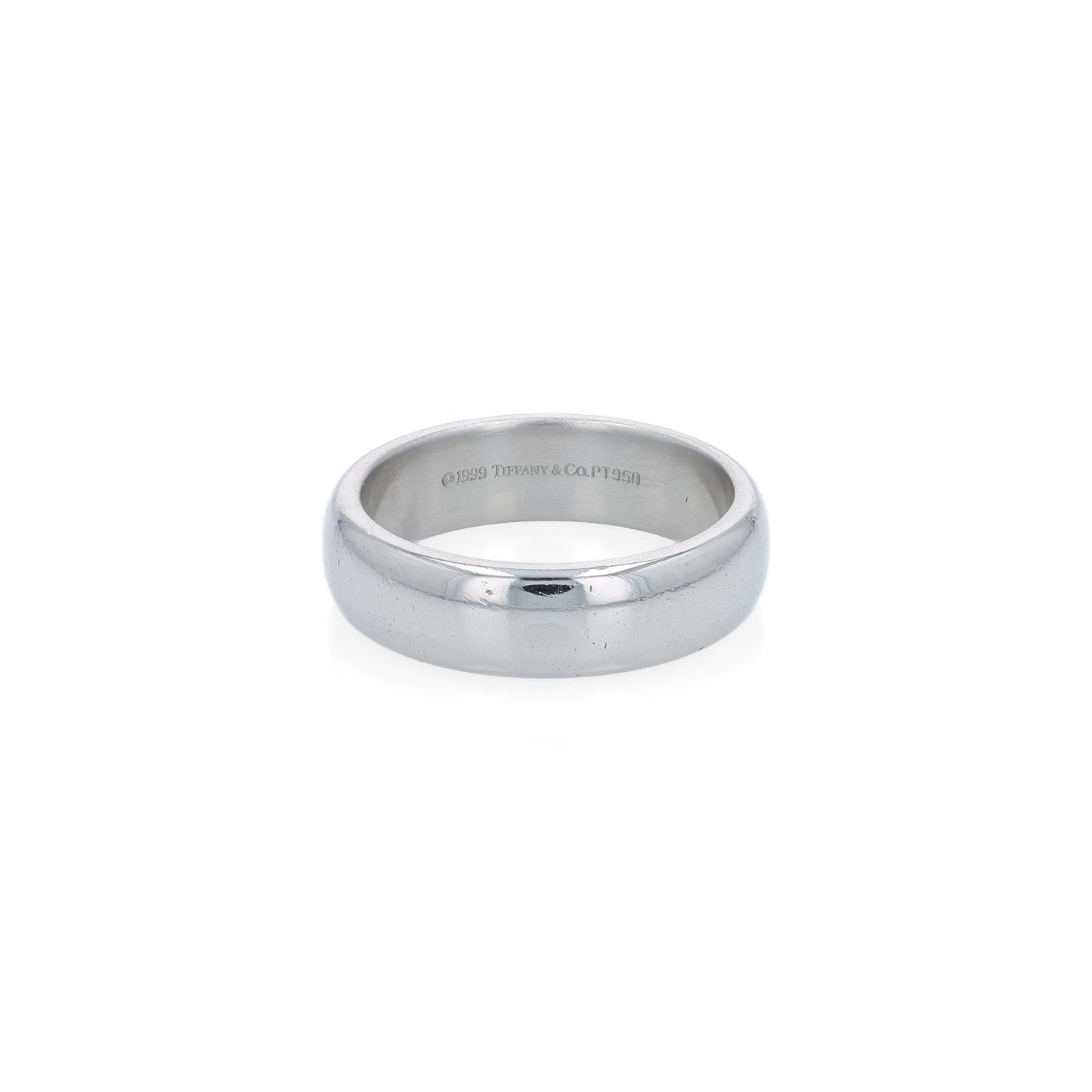 Tiffany & Co platinum wedding band on a white background