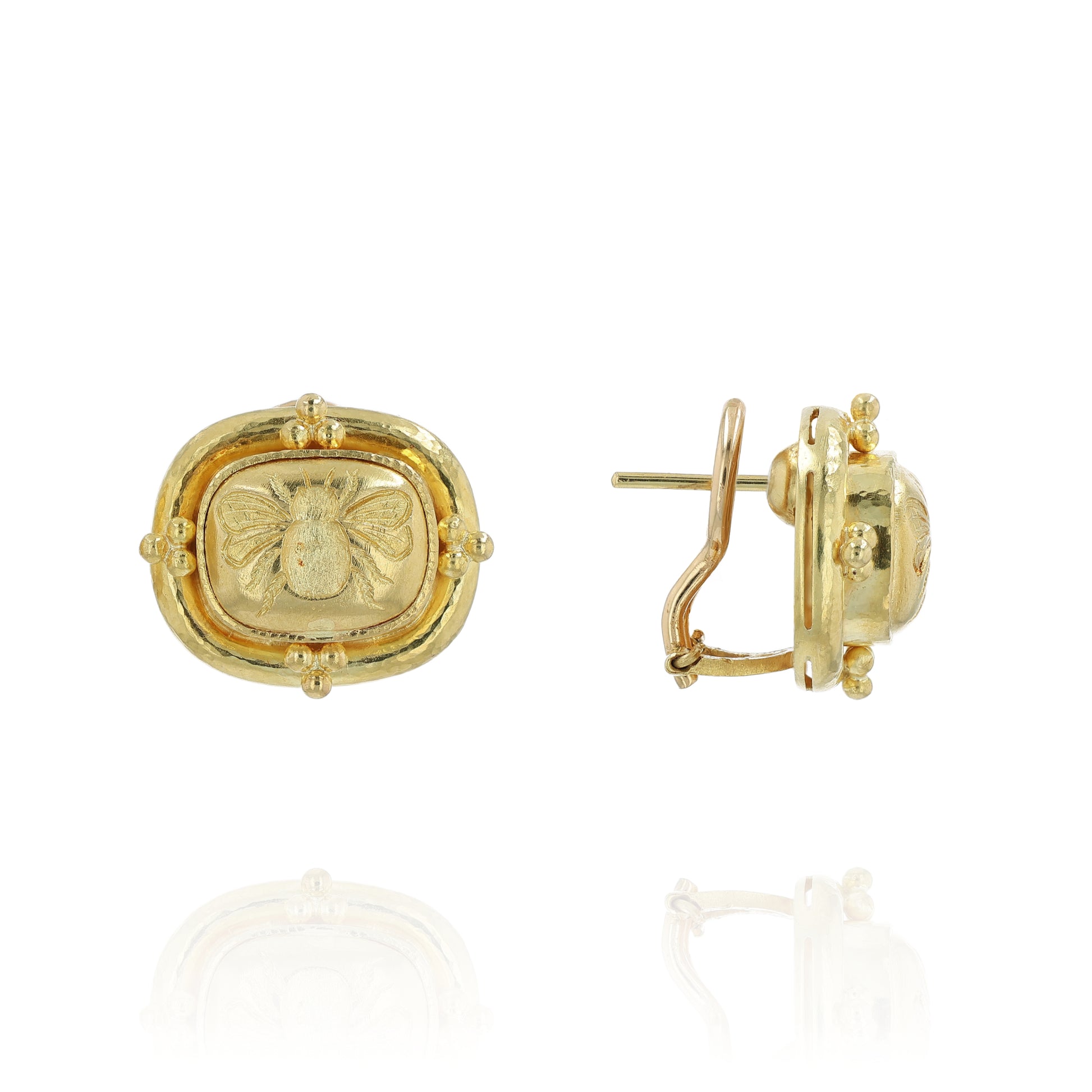 Textured yellow gold stud earrings with an embossed bee design on a white background