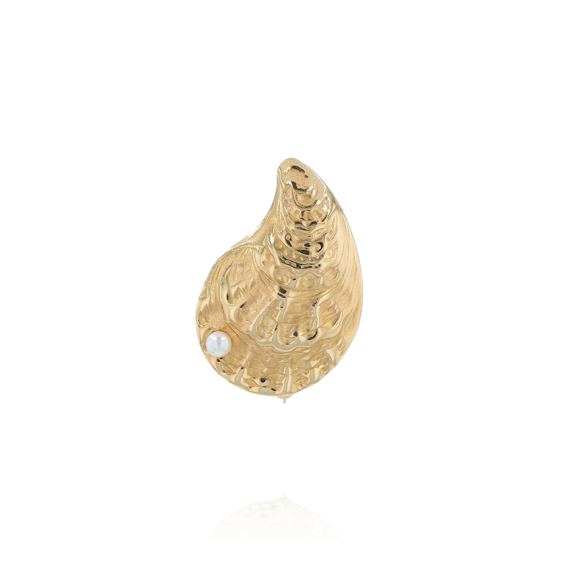 Yellow gold oyster shell pin with a pearl on a white background