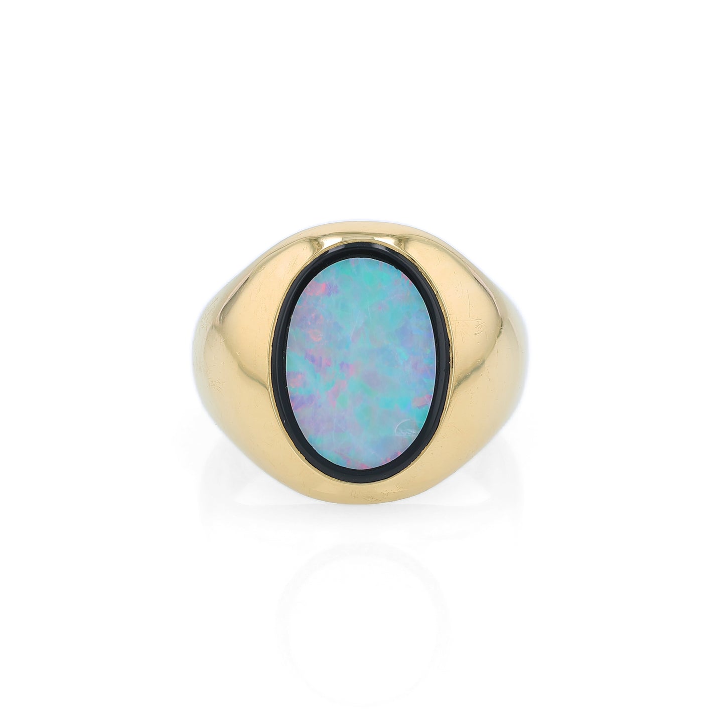 Yellow Gold oval opal doublet signet style ring on a white background