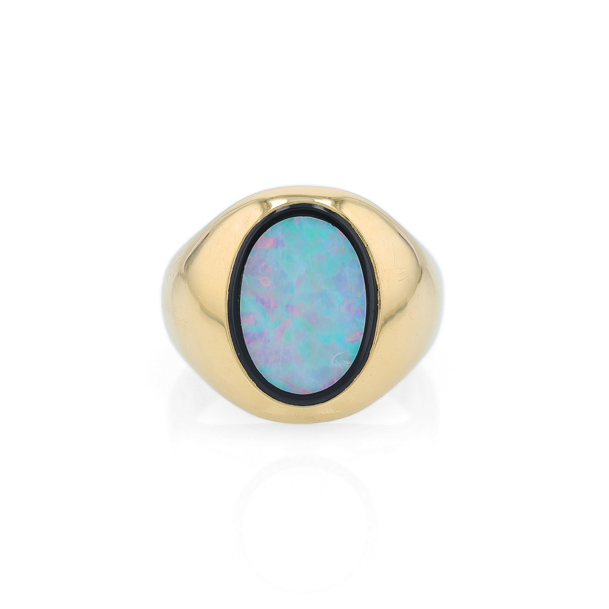 Yellow Gold oval opal doublet signet style ring on a white background