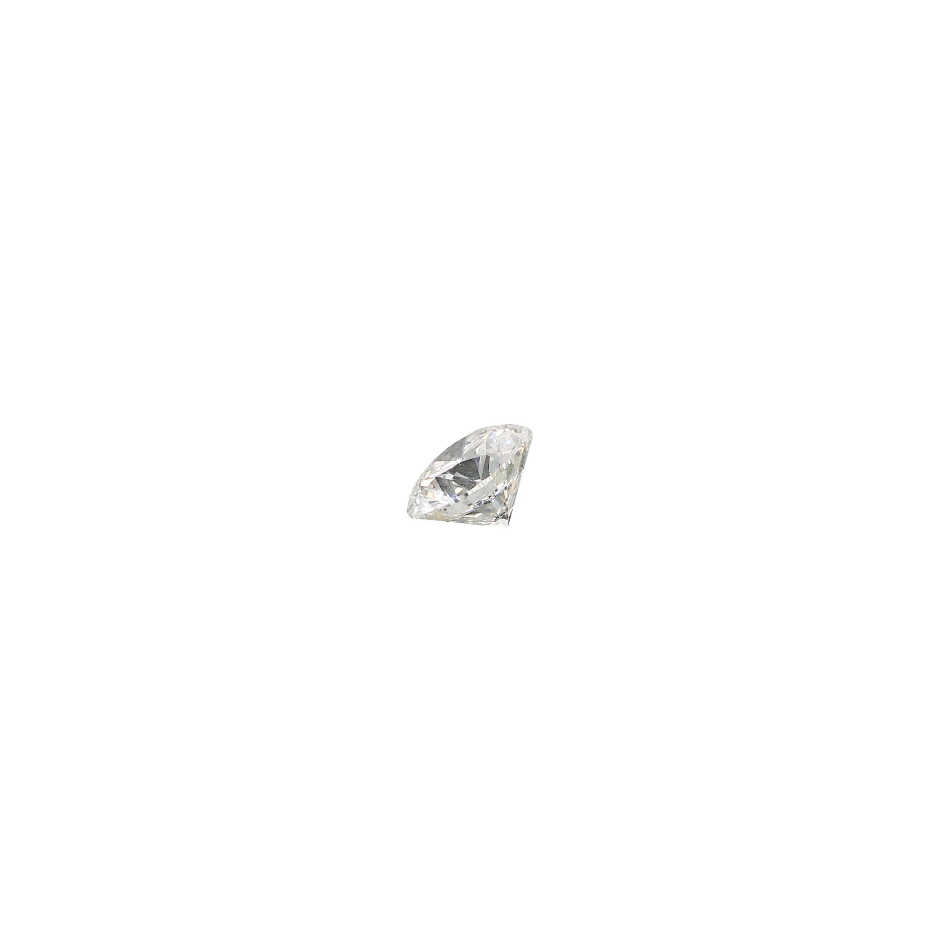 Round .56 carat triple excellent GIA certified diamond graded GSI1 on a white background