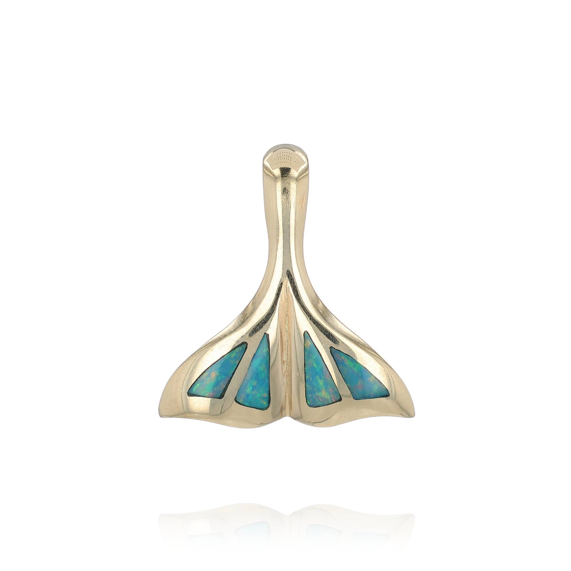A yellow gold whale tail design slide pendant with opal inlays on the tail, shown on a white background