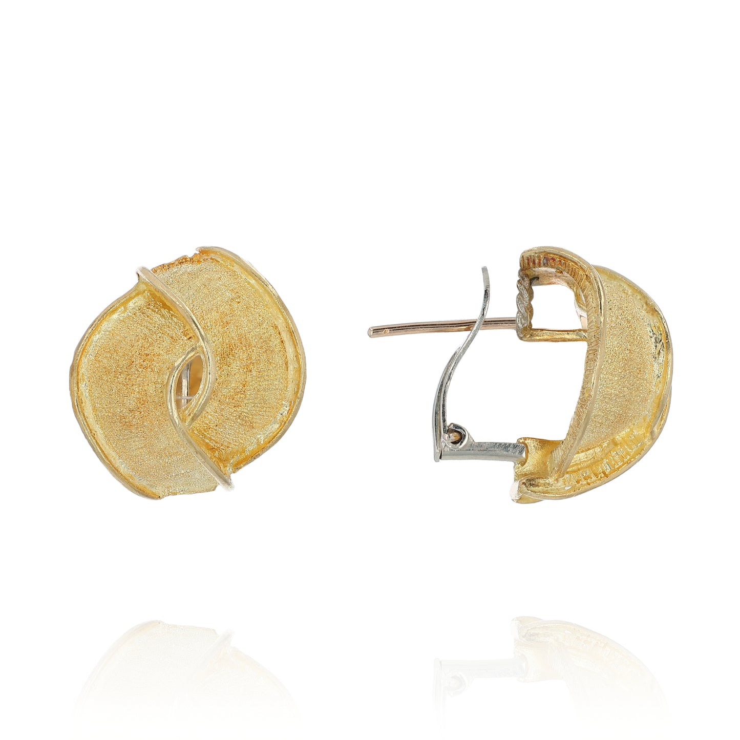 Textured gold earrings on a white background