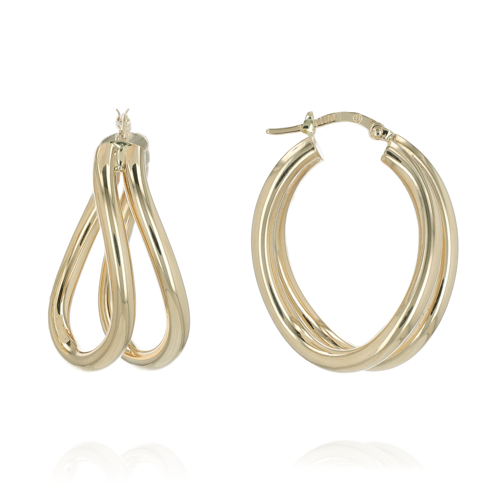 Gold double tube hoop earrings on a white background