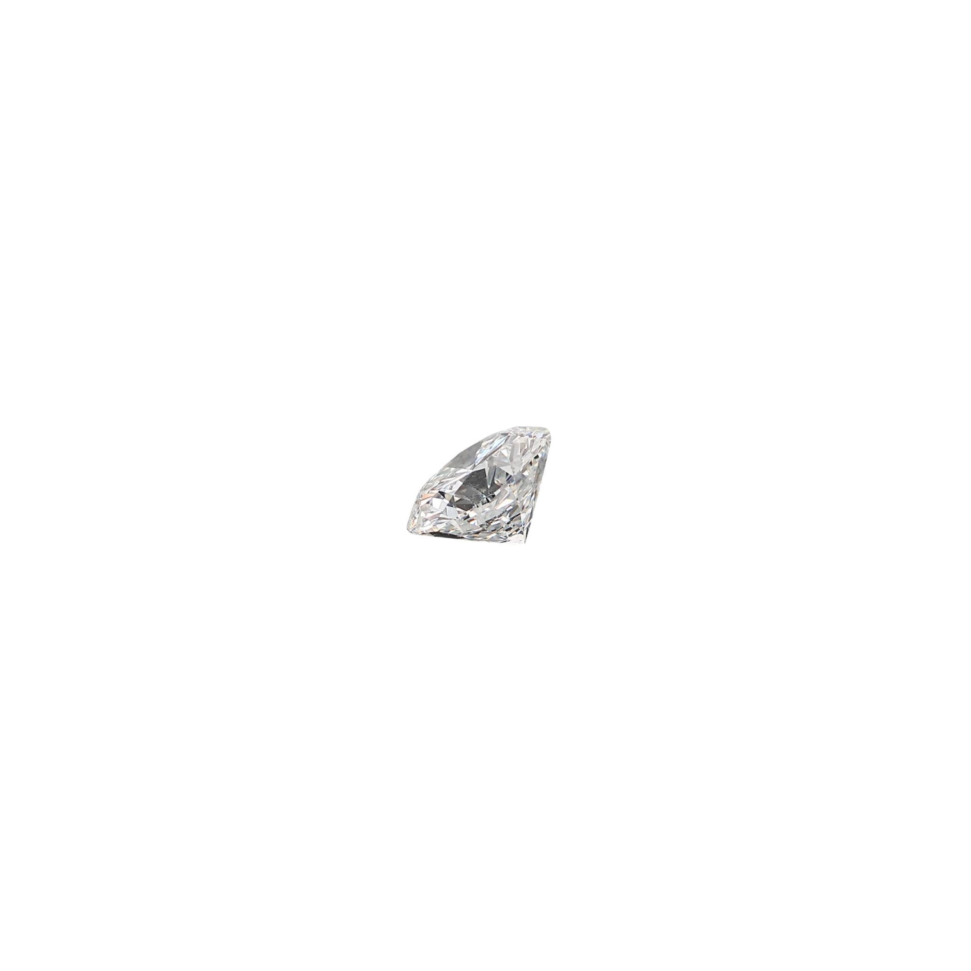 Round .79 carat diamond graded FSI1 on a white background