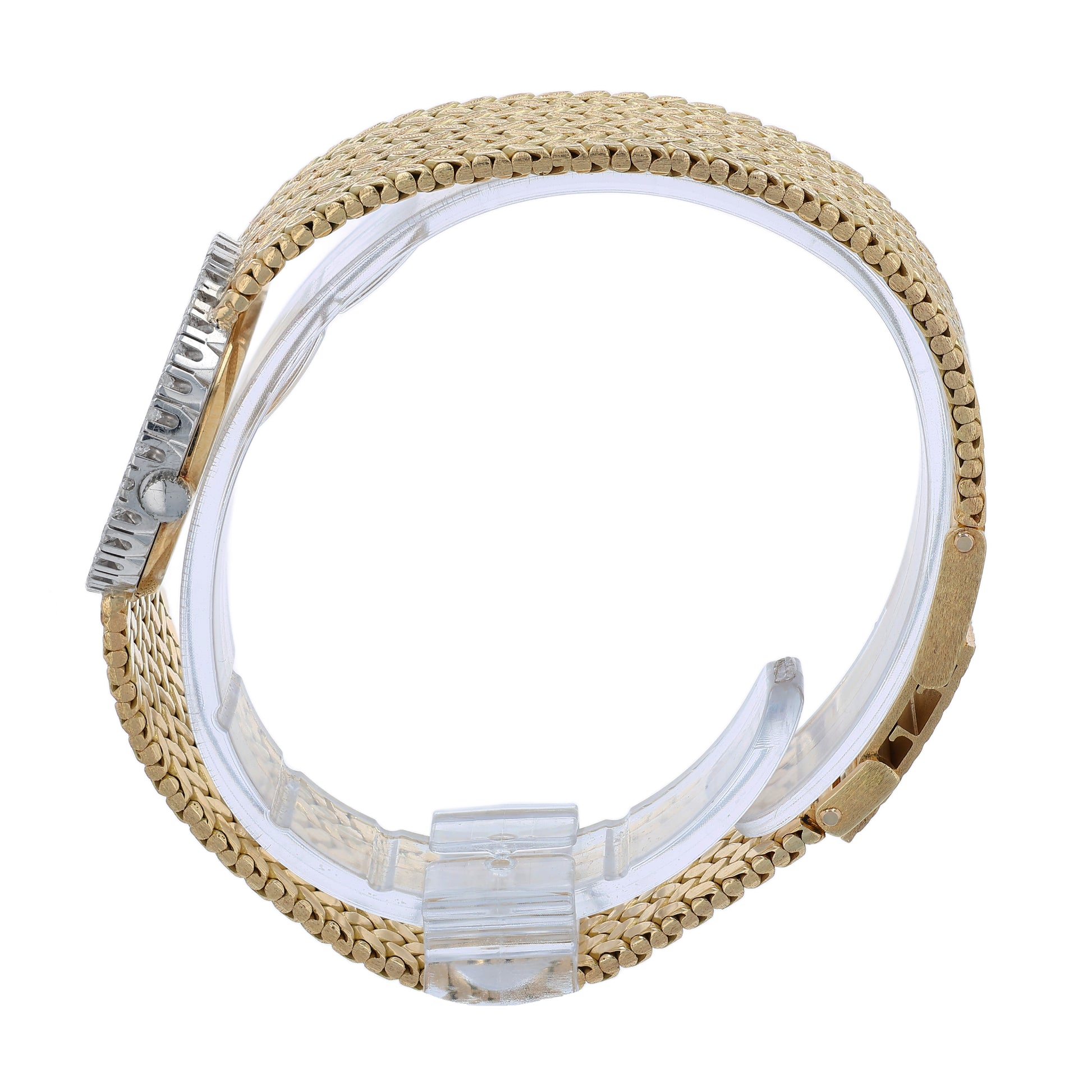 Side profile of a two-tone watch with a basketweave bracelet on a white background