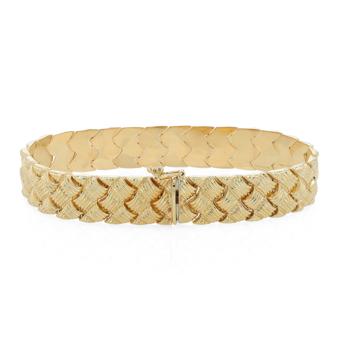 Textured yellow gold basket weave link bracelet on a white background