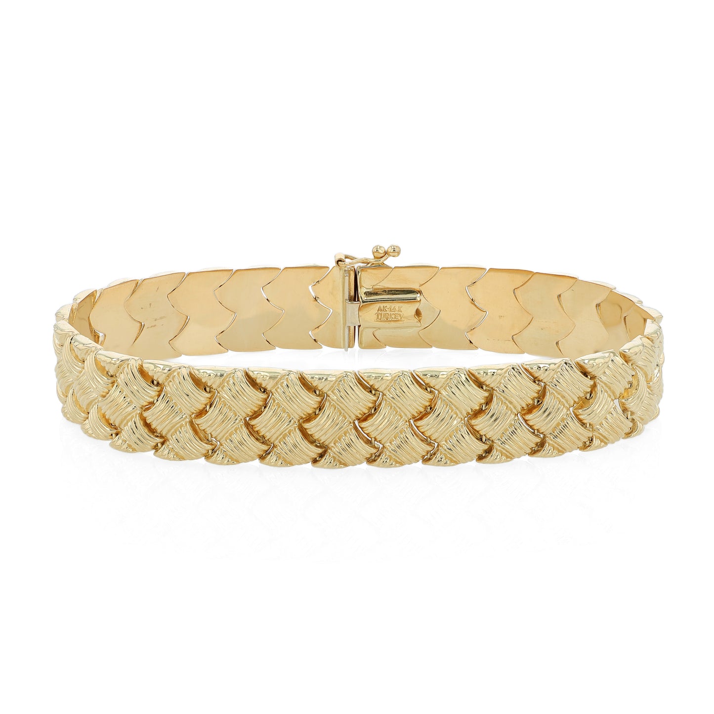Textured yellow gold basket weave link bracelet on a white background