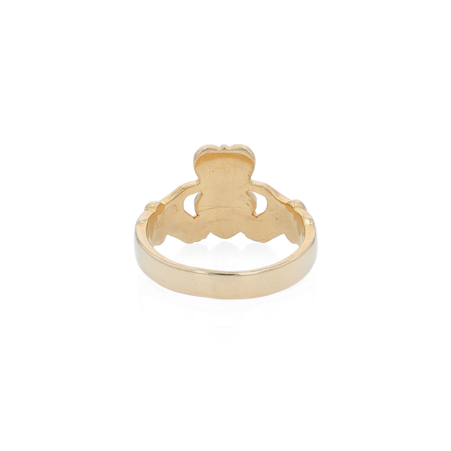 Yellow gold gents Claddagh ring on a white background