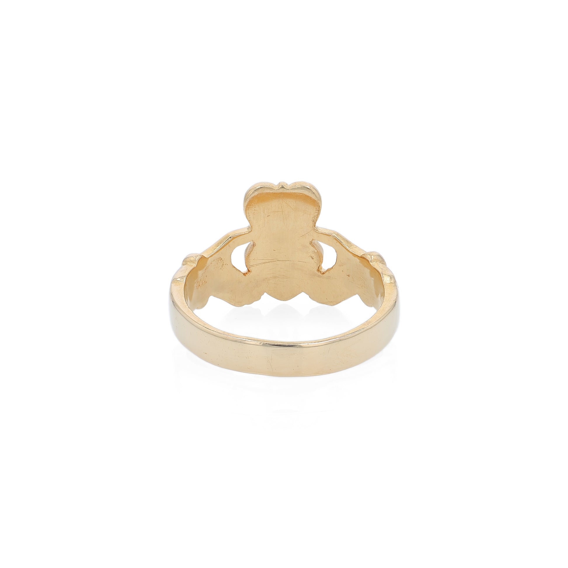Yellow gold gents Claddagh ring on a white background