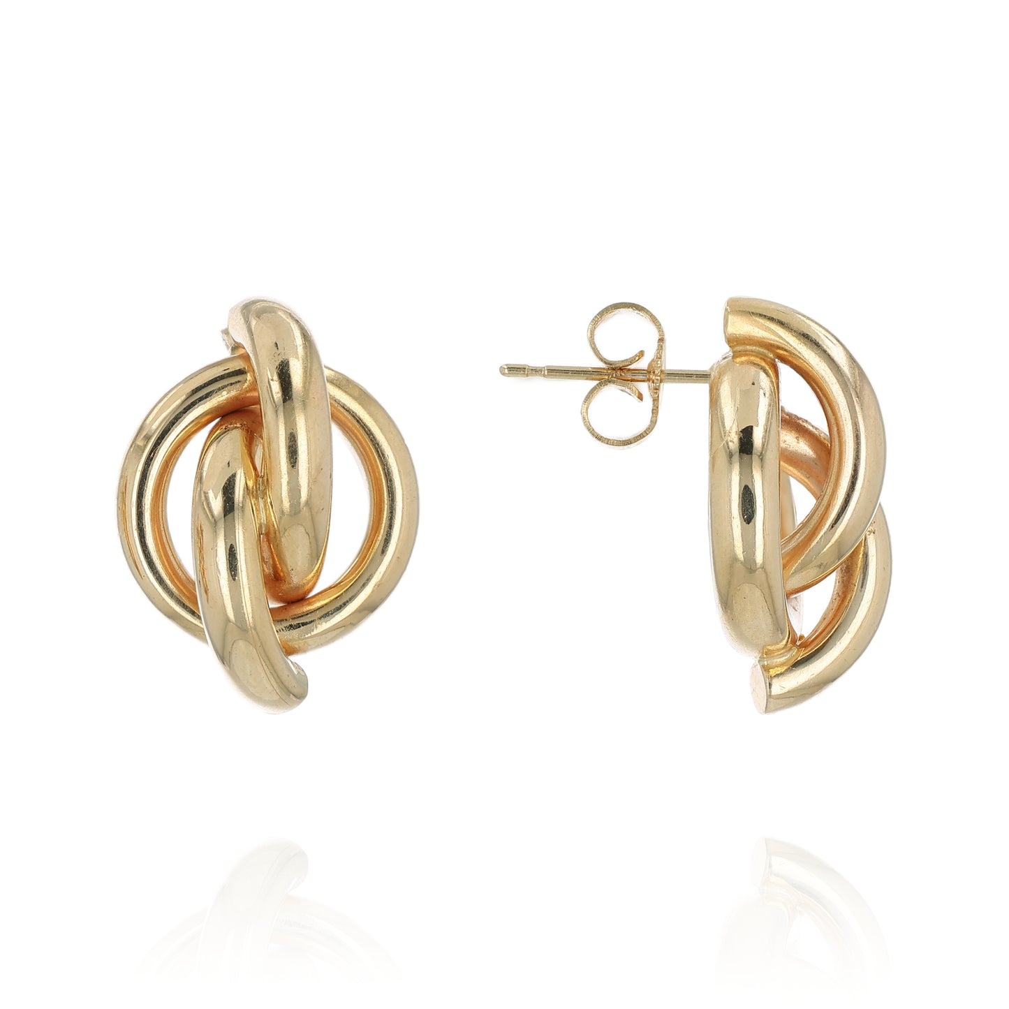 Gold knot earrings on a white background