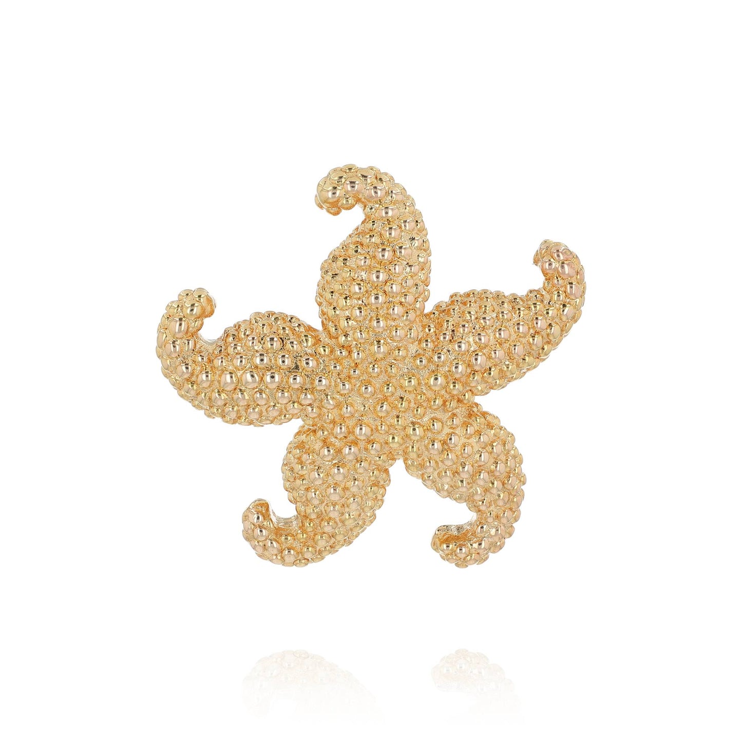 A yellow gold textured starfish design pin on a white background