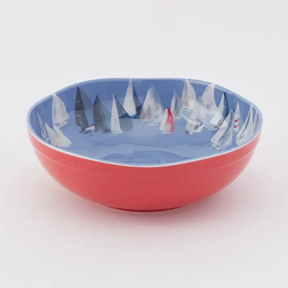 Ceramic bowl with sailboat design on a white background