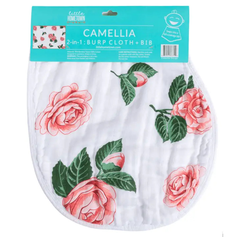 Floral-patterned 2-in-1 burp cloth and bib with packaging on a white background