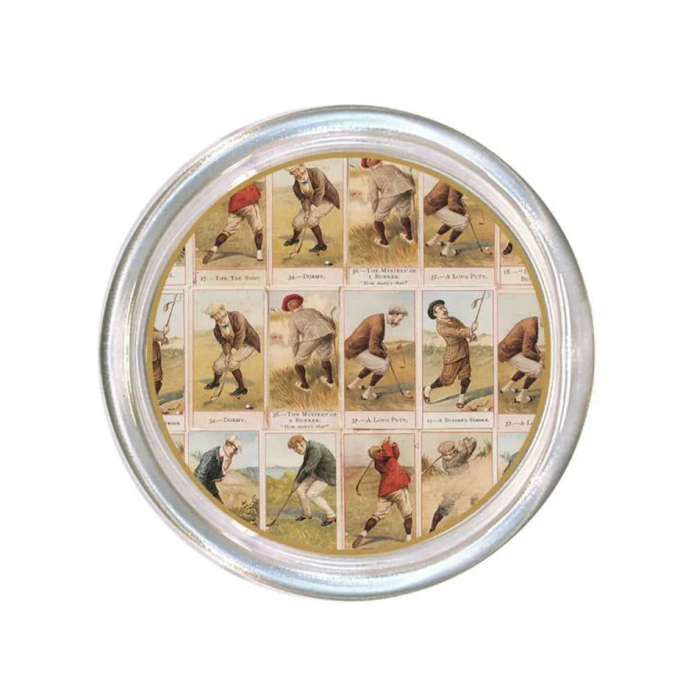 Round glass coaster with a rim with vintage illustrations of people playing golf on a white backround 