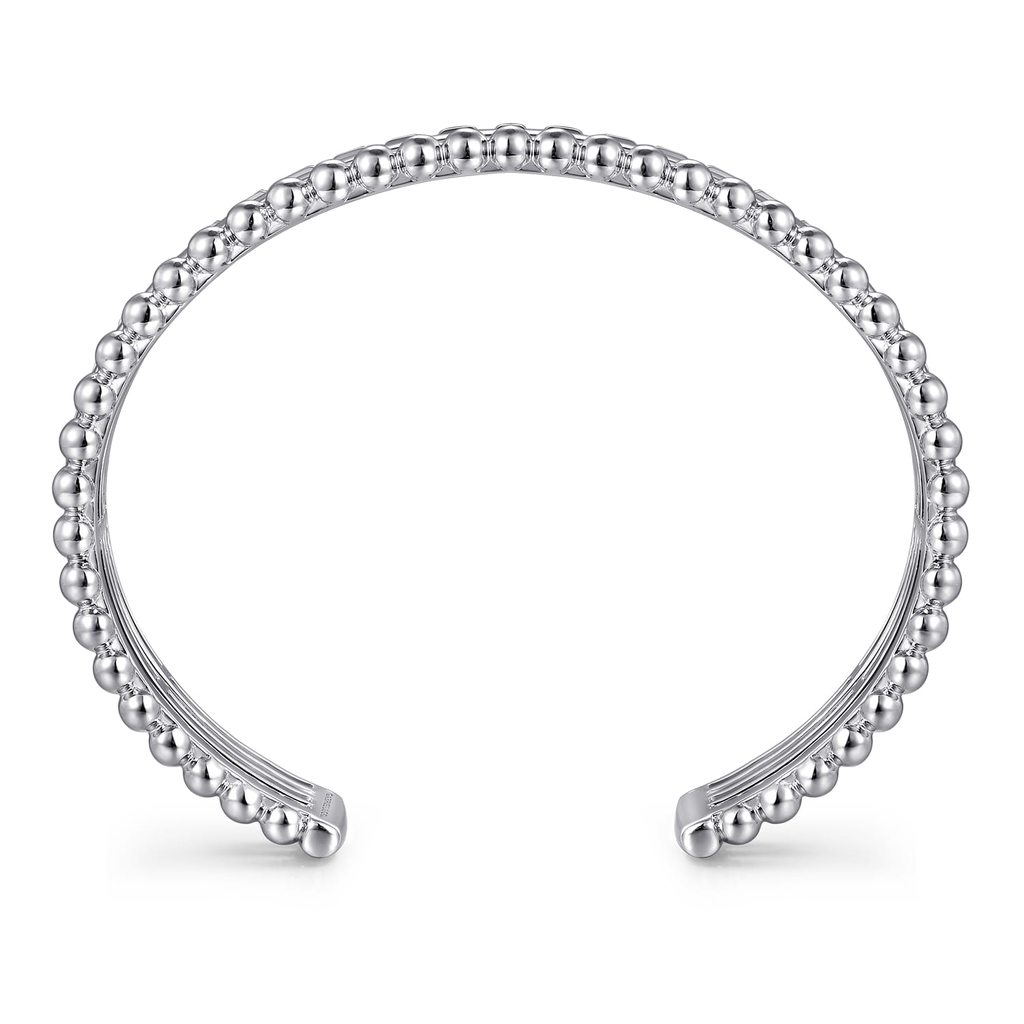 Silver beaded bracelet on a white background