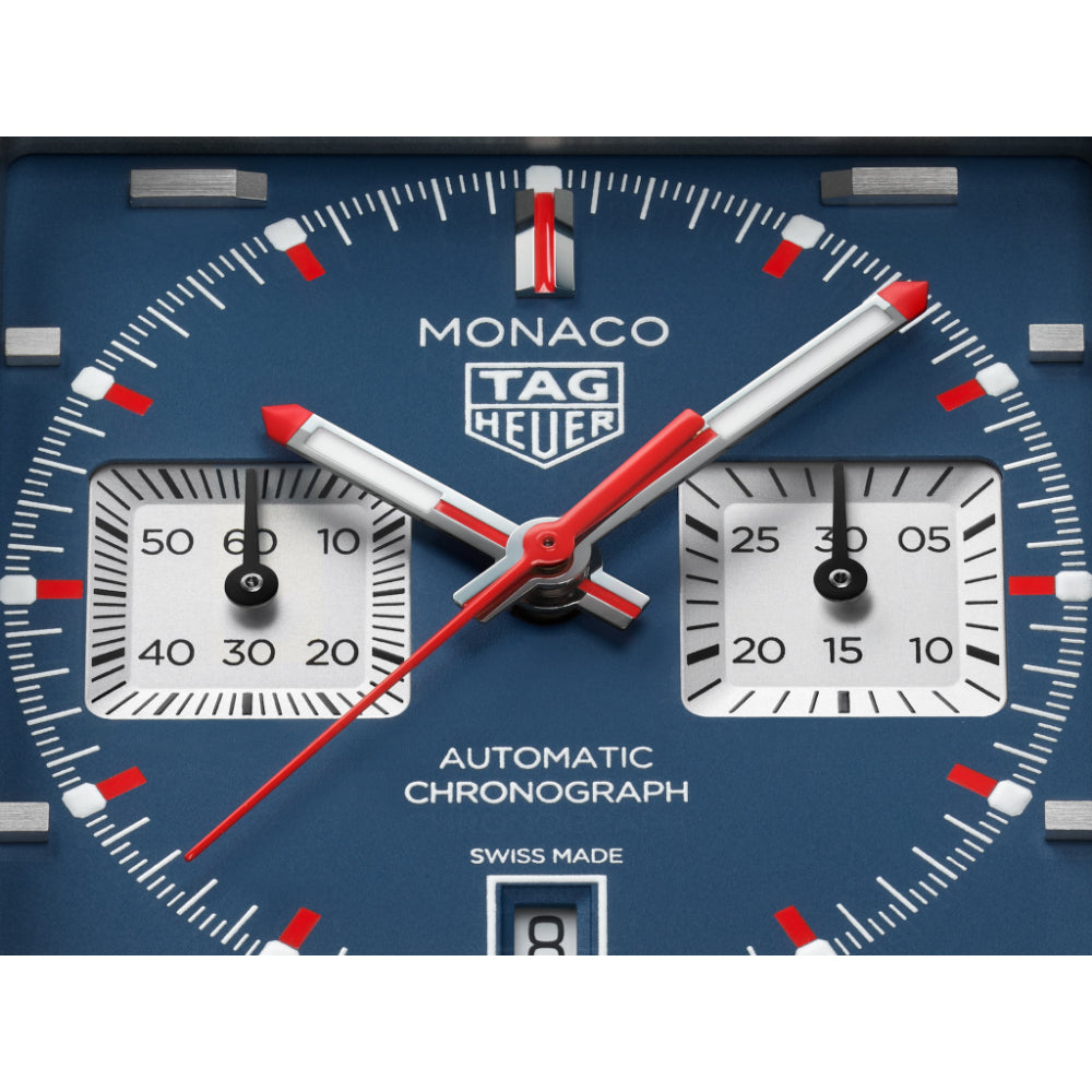 TAG Heuer Monaco watch face with blue background and red and white accents
