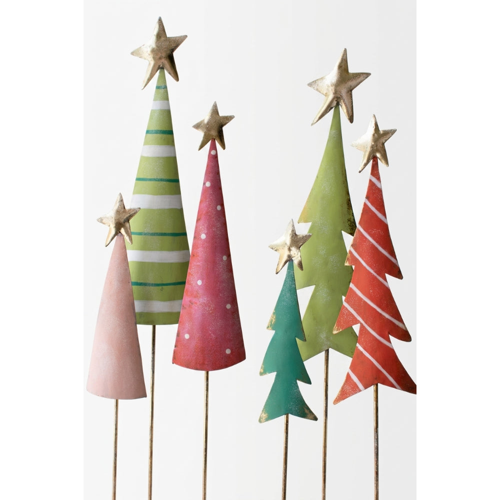 A set of six decorative metal Christmas tree picks on wooden sticks, featuring various colors and patterns including stripes, polka dots, and solid fills in pink, green, teal, and red, with gold star toppers.