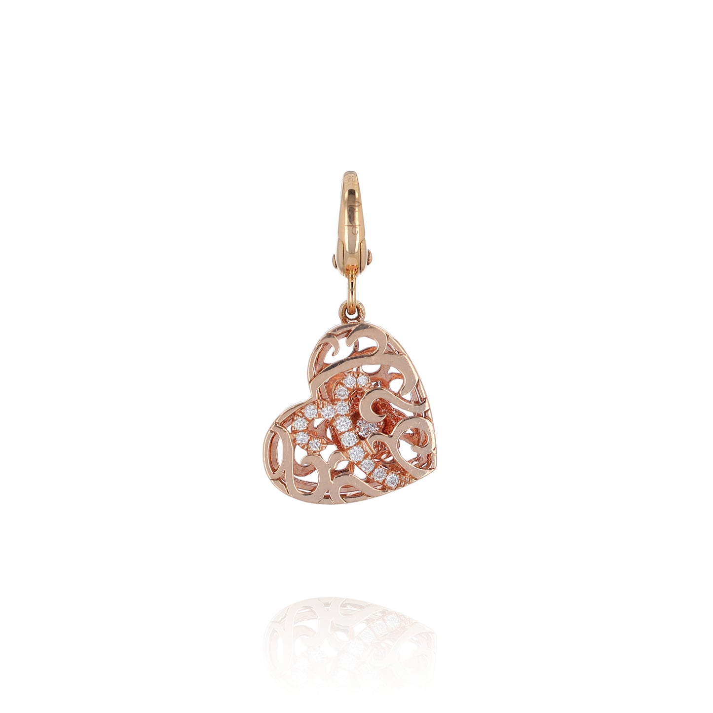 Rose gold filigree design diamond heart charm pendant on a white background