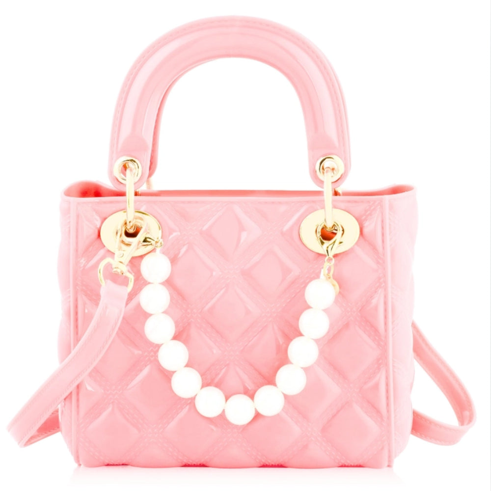 A quilted ballet pink handbag with a matching cross-body strap and attached white pearls
