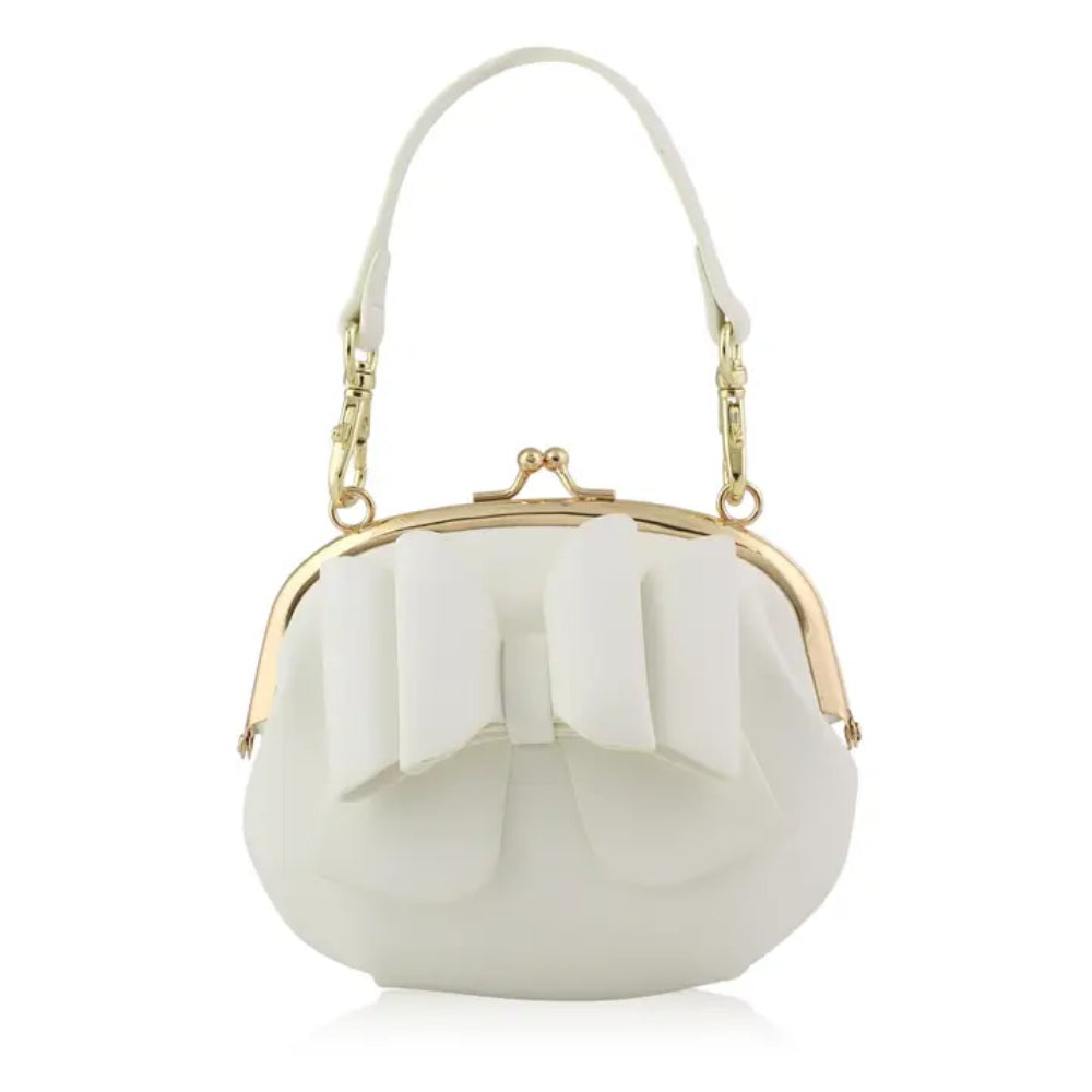 White handbag with a large bow on a white background
