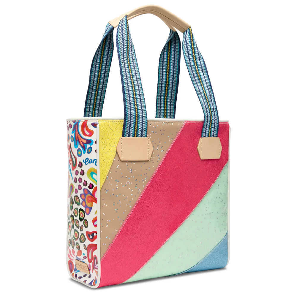 Colorful tote bag with geometric pattern and wooden handle on white background