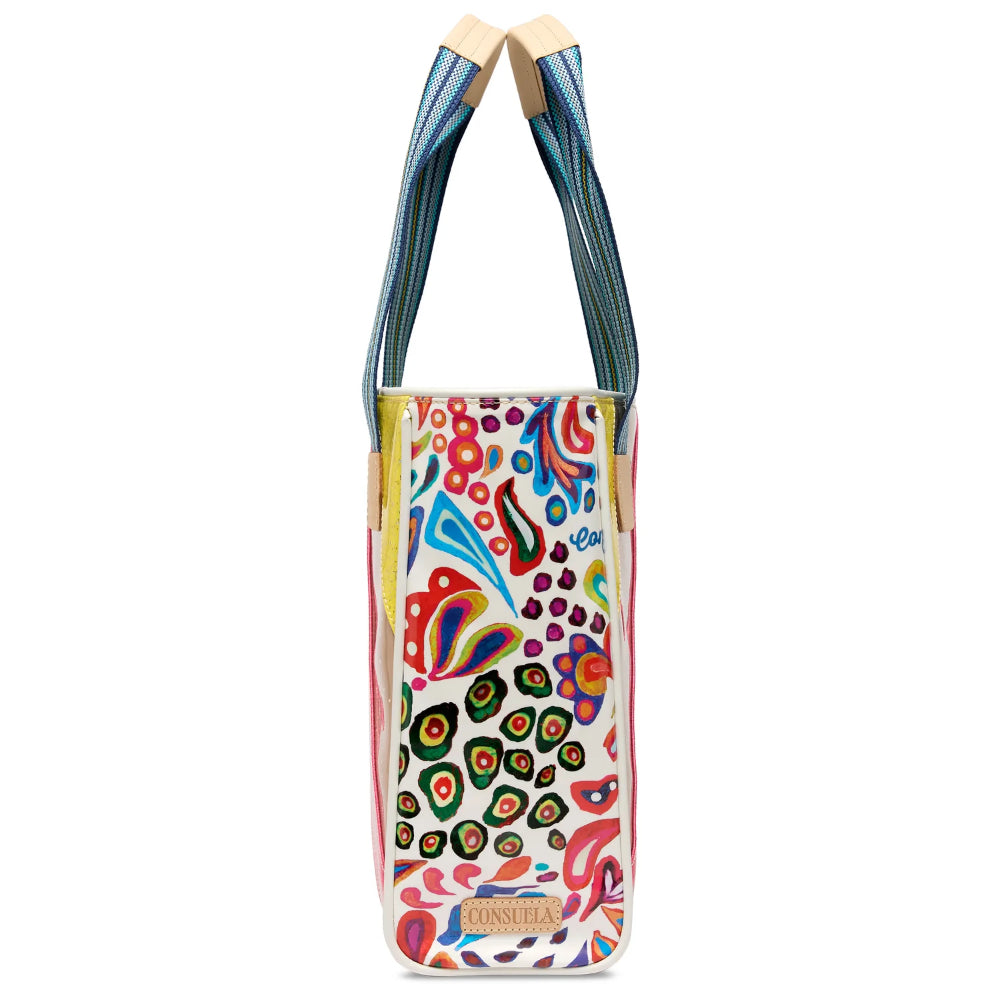 Colorful floral-patterned bag with blue handles on a white background