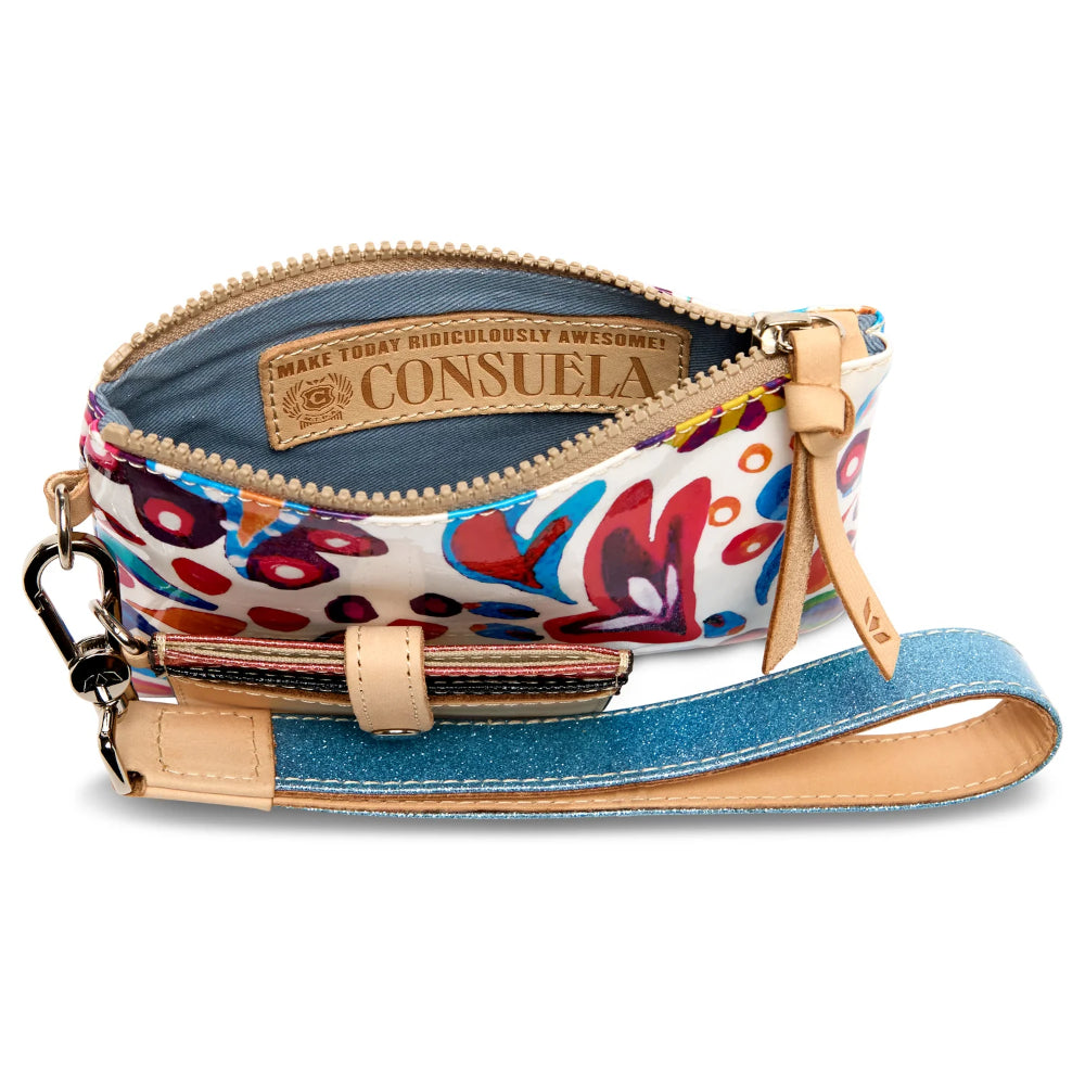 Colorful Wrist wallet with floral pattern and denim accents, featuring Consuela branding.