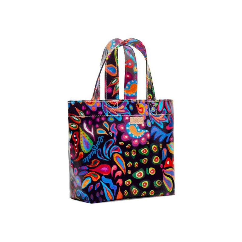 A multicolored floral tote bag with a ConsuelaCloth exterior.