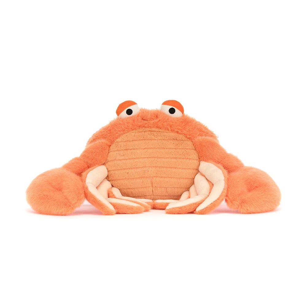 A photo of an orange pinchsnap crab plush toy on a white backround