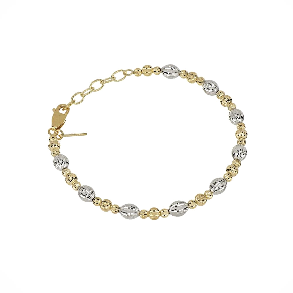 Bracelet with gold and silver beads on a white background